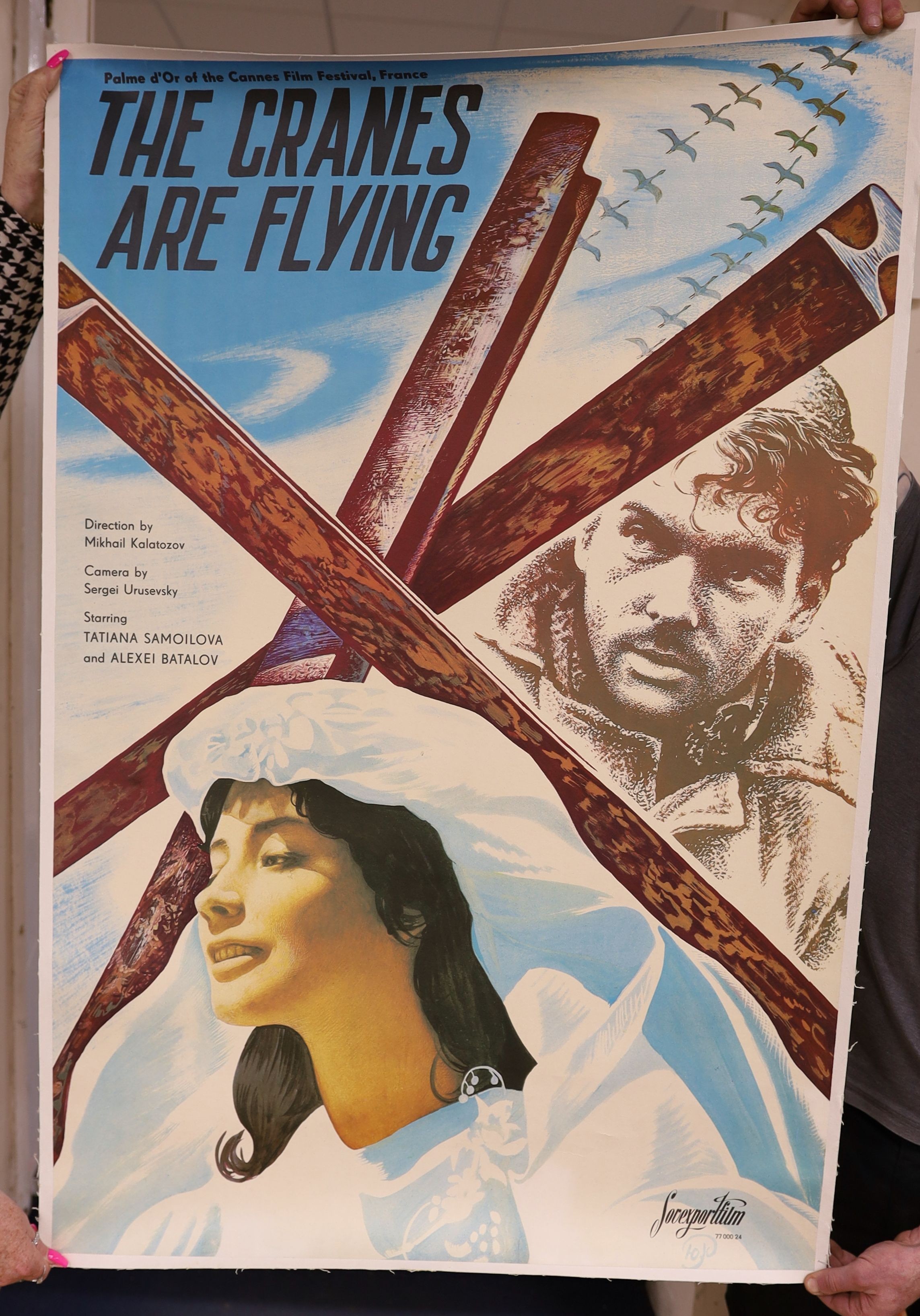 A Cannes Film Festival film poster on canvas backing:, “ The Cranes Are Flying”.